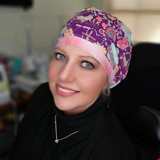 A healthcare professional wearing the Christian faith Euro-style scrub cap, demonstrating how it tucks in hair for a professional OR look.