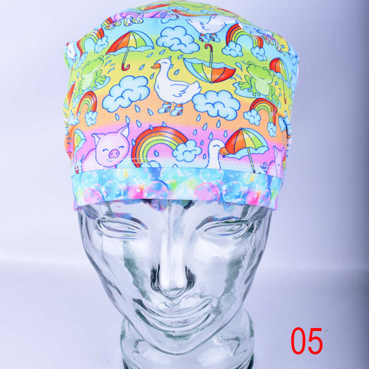 Close-up of premium blue raindrop print cotton-elastane knit fabric for medical scrub caps, showing the soft texture and vibrant colors.