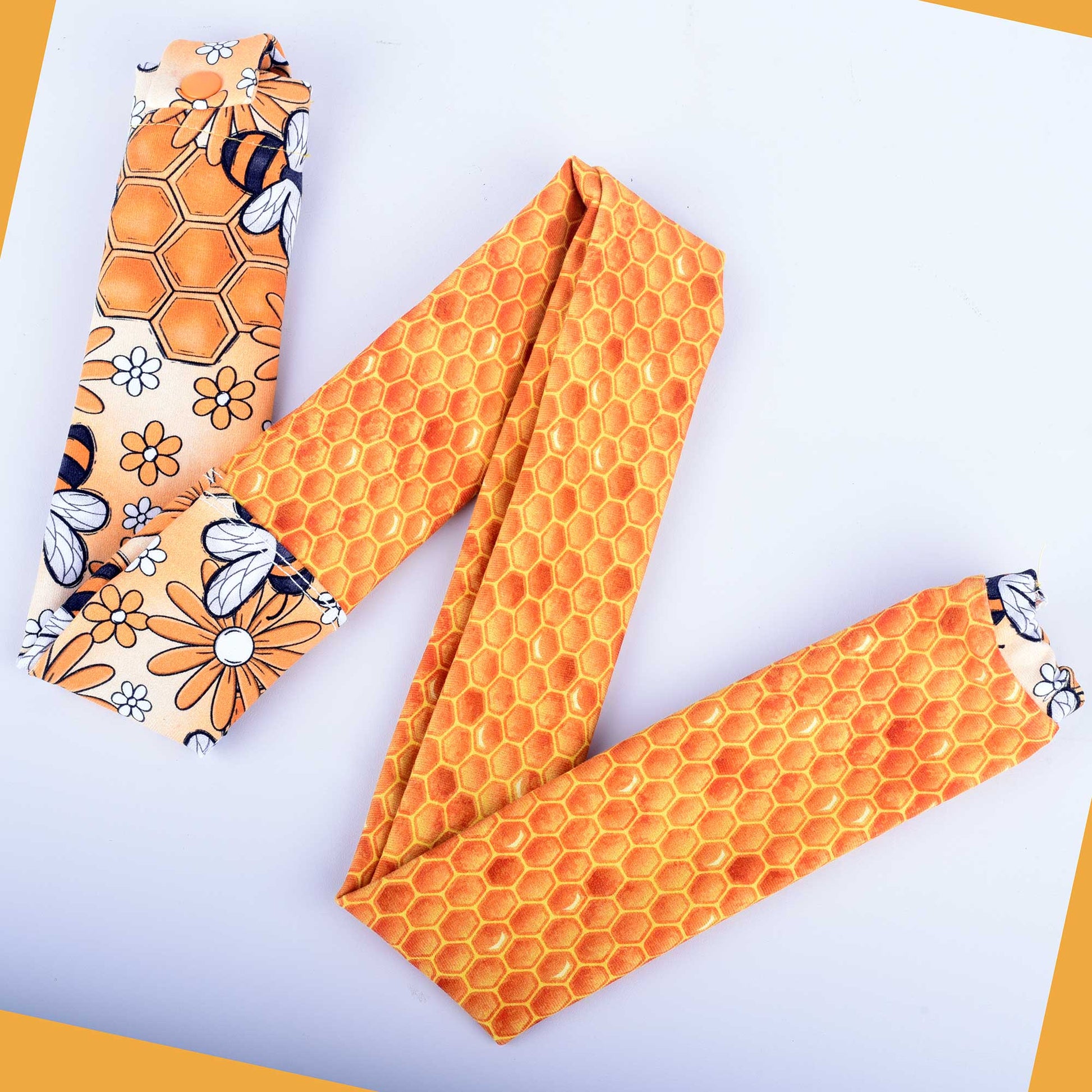 Busy Bees stethoscope cover featuring yellow honeybees and white flowers on stretchy cotton fabric.