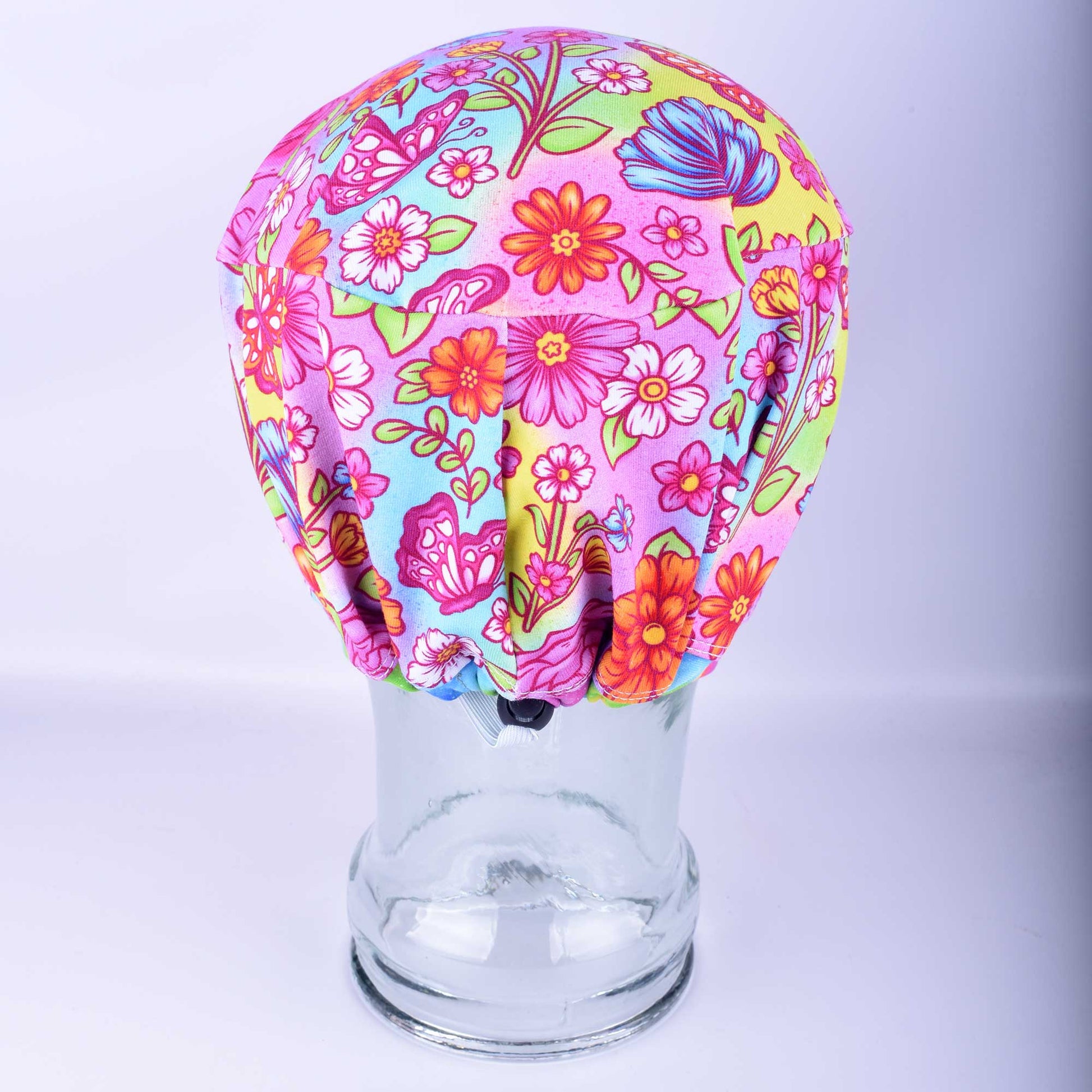 Back view of the Butterflies and Flowers scrub cap showing the full-coverage Euro style fit for long hair and the heavy-duty adjustable toggle.