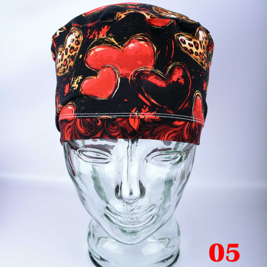 Classy Hearts Scrub Cap featuring a red and black heart pattern with cheetah print accents.