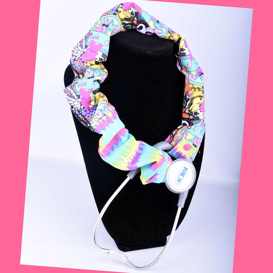Colorful Easter stethoscope cover with pastel eggs, flowers, and bunnies on a stethoscope.