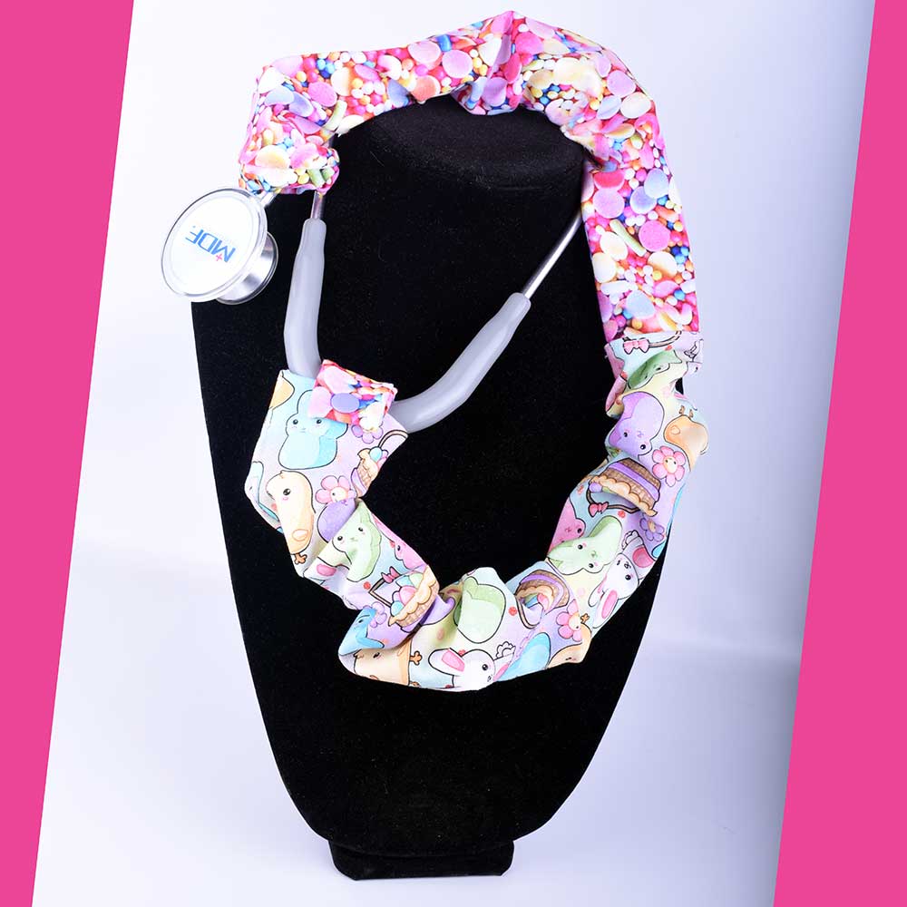 Handmade Easter Friends stethoscope cover with a festive bunny and spring floral print, shown wrapped around a gray stethoscope.