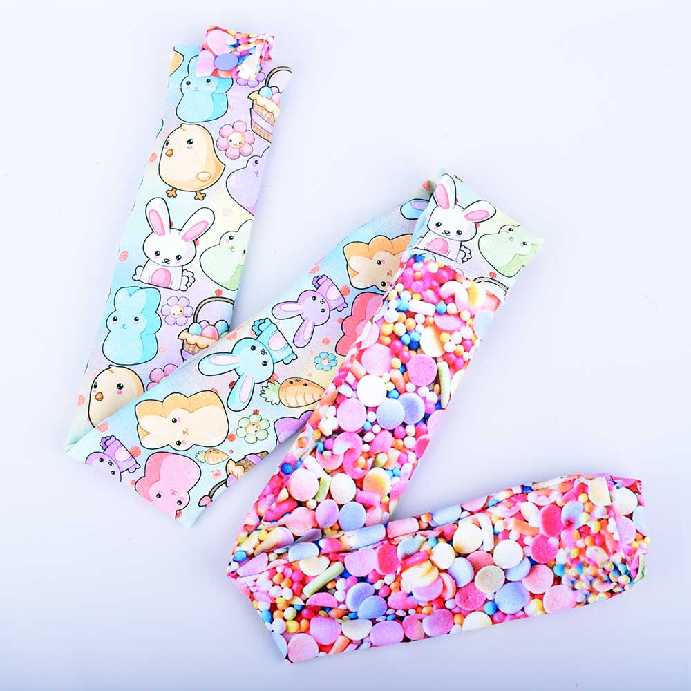 Full-length view of a 32-inch Easter-themed stethoscope sleeve with a secure white plastic snap and elastic ends for a universal fit.