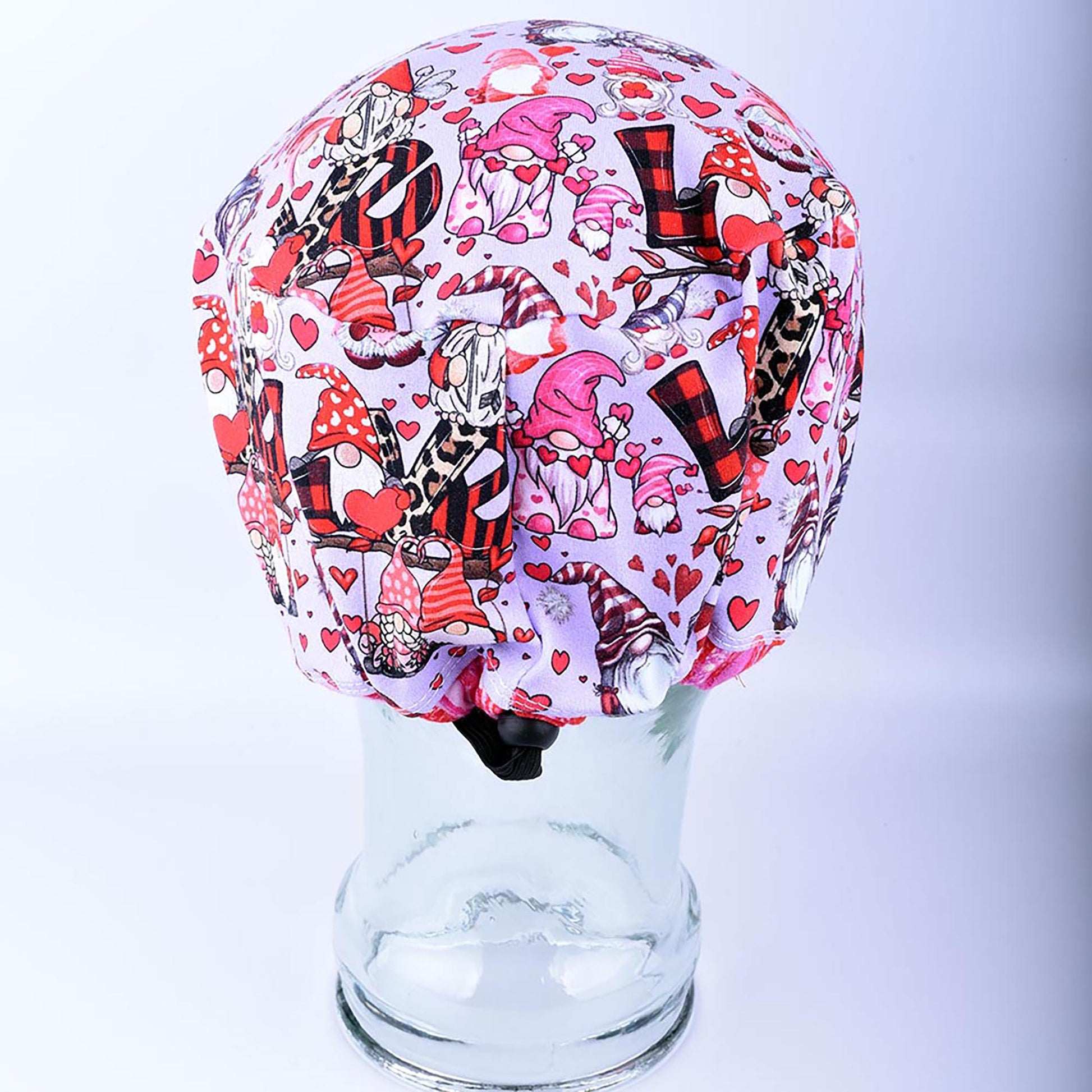 Rear view of a festive holiday surgical hat showcasing the encased elastic casing and a heavy-duty adjustable cord-lock toggle for a secure, custom fit.