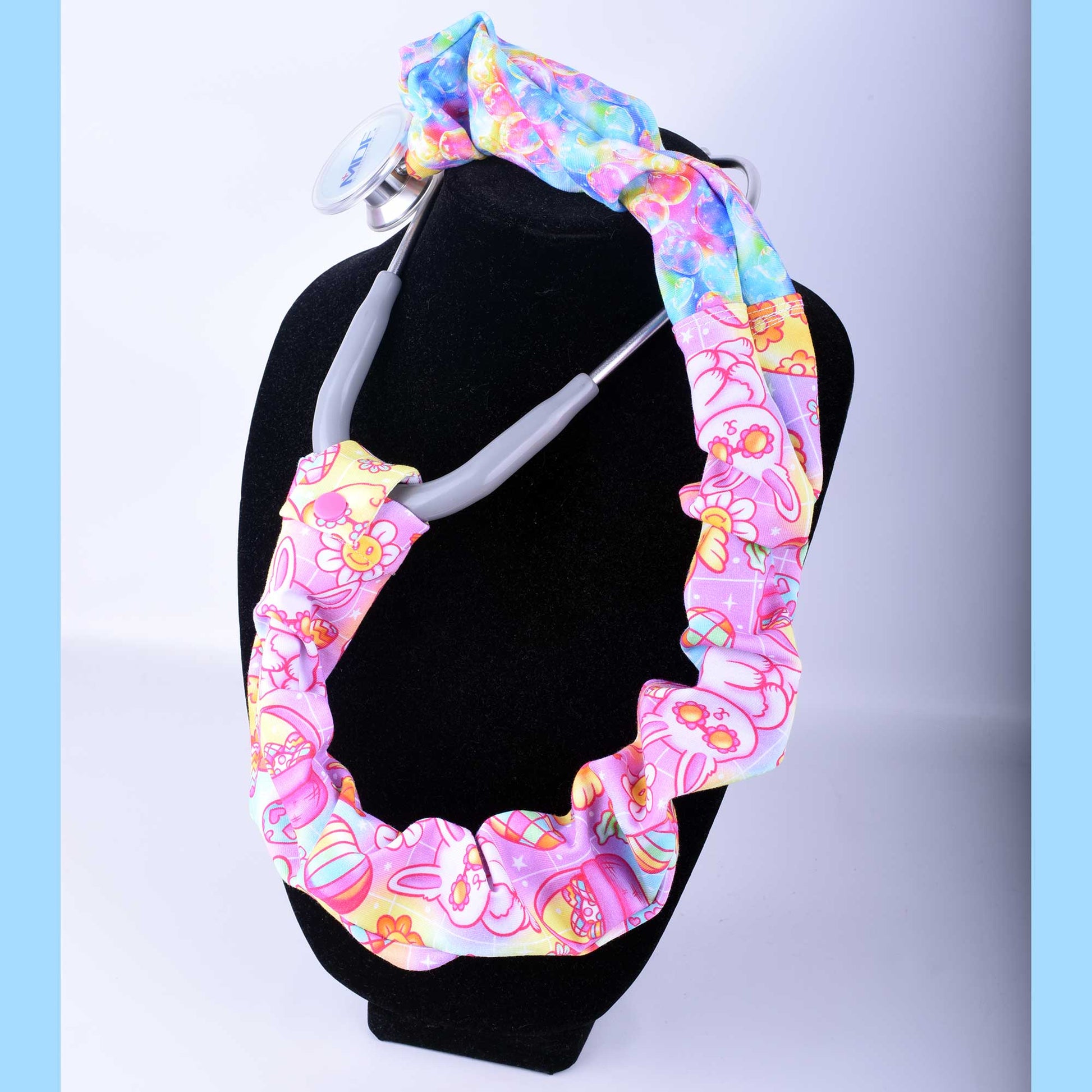 Colorful retro-style Easter bunny patterned stethoscope sleeve.