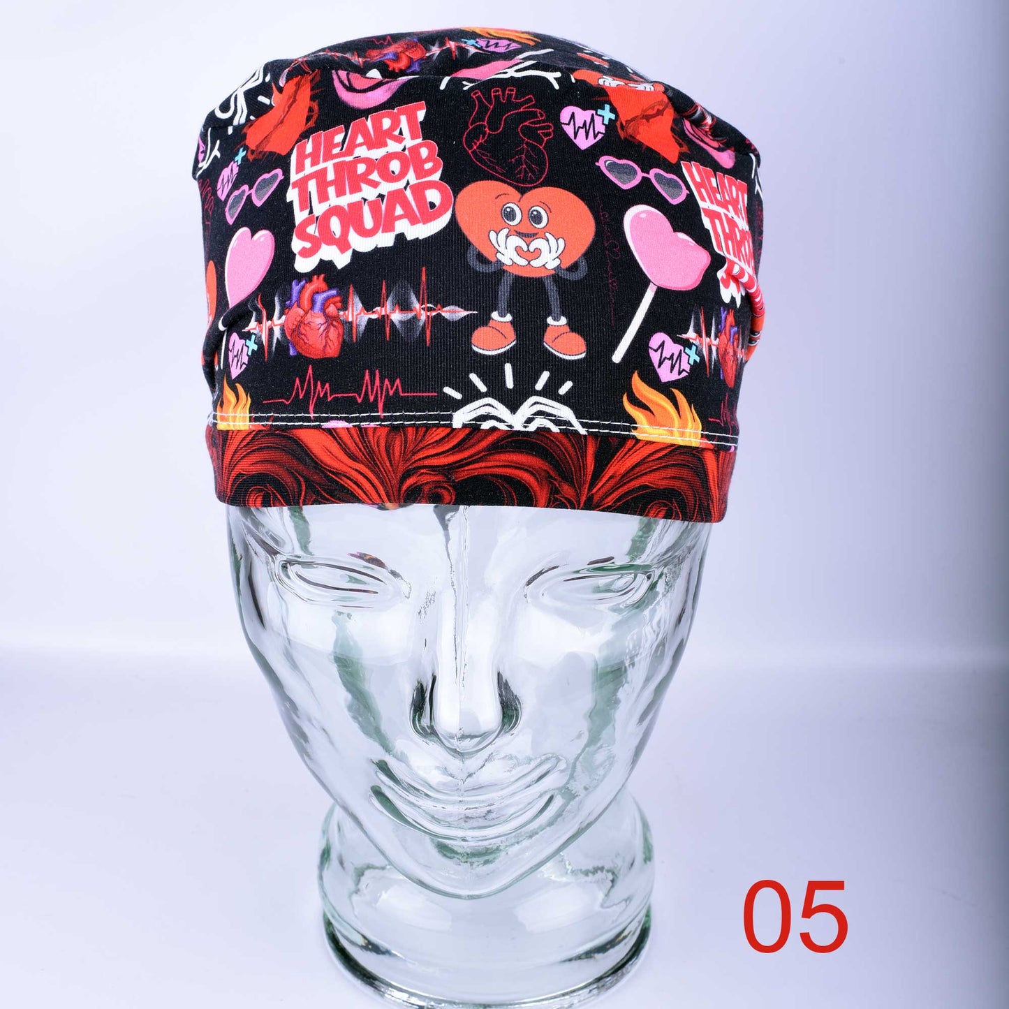 Front view of the Heart Throb Squad Scrub Cap showing the deep, full-coverage fit and stretchy cotton fabric.