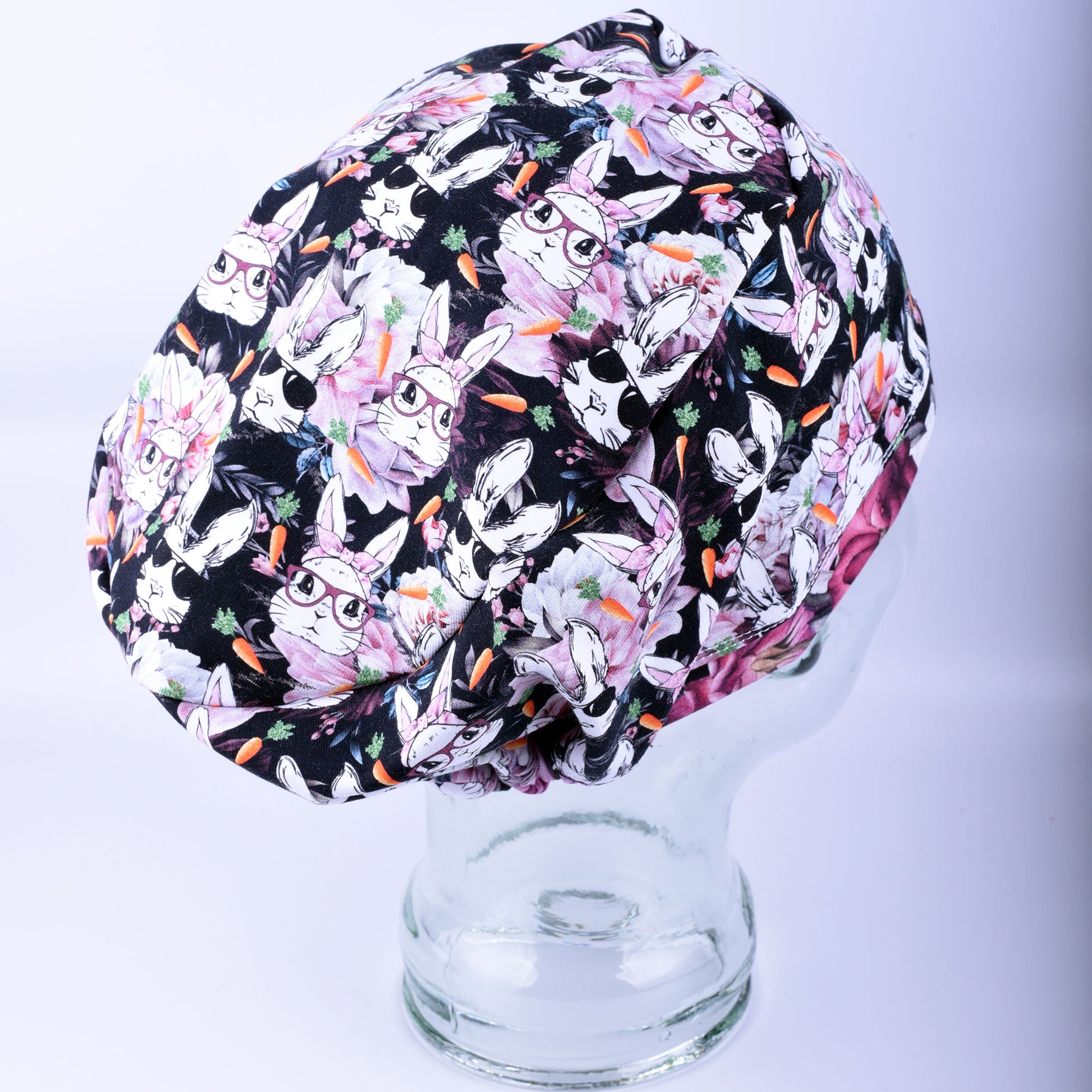 Full coverage medical headwear designed for long shifts, featuring an adjustable toggle and festive rabbit design.