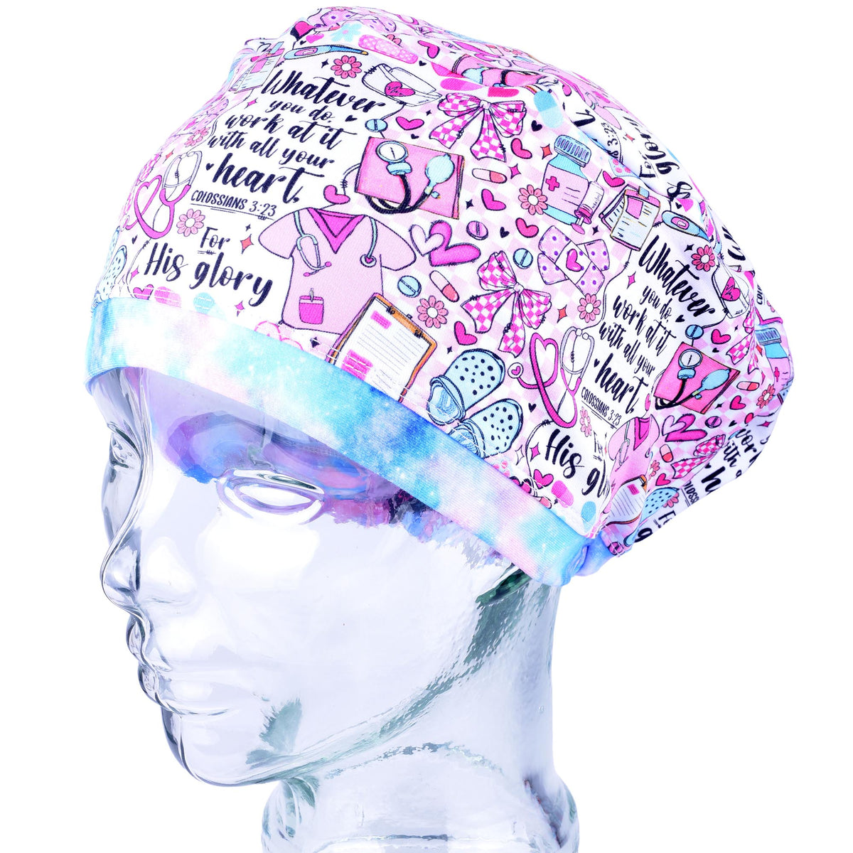 A pink and blue scrubs cap with a medical-themed cartoon pattern, displayed on a clear mannequin head against a white background.