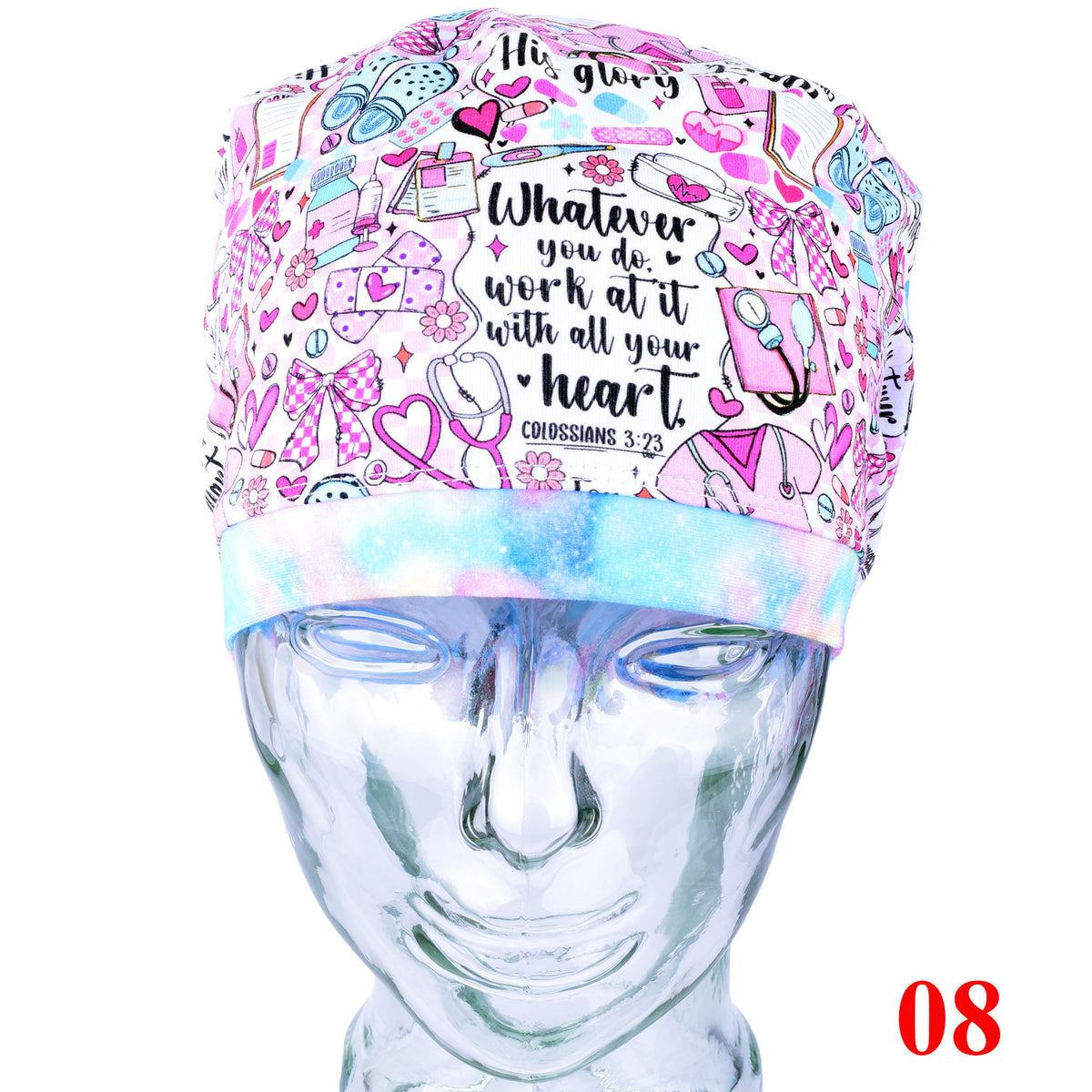 A pink and white patterned medical scrub cap displayed on a glass mannequin head. The cap features a busy medical-themed print with stethoscopes, hearts, pills, and the quote 'Whatever you do, work at it with all your heart.