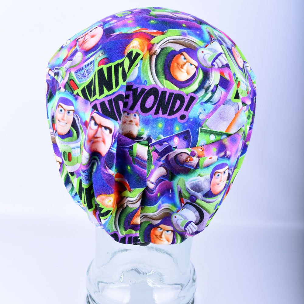 Back View of a  full-coverage surgical scrub cap featuring a vibrant, colorful astronaut space theme on a white background.