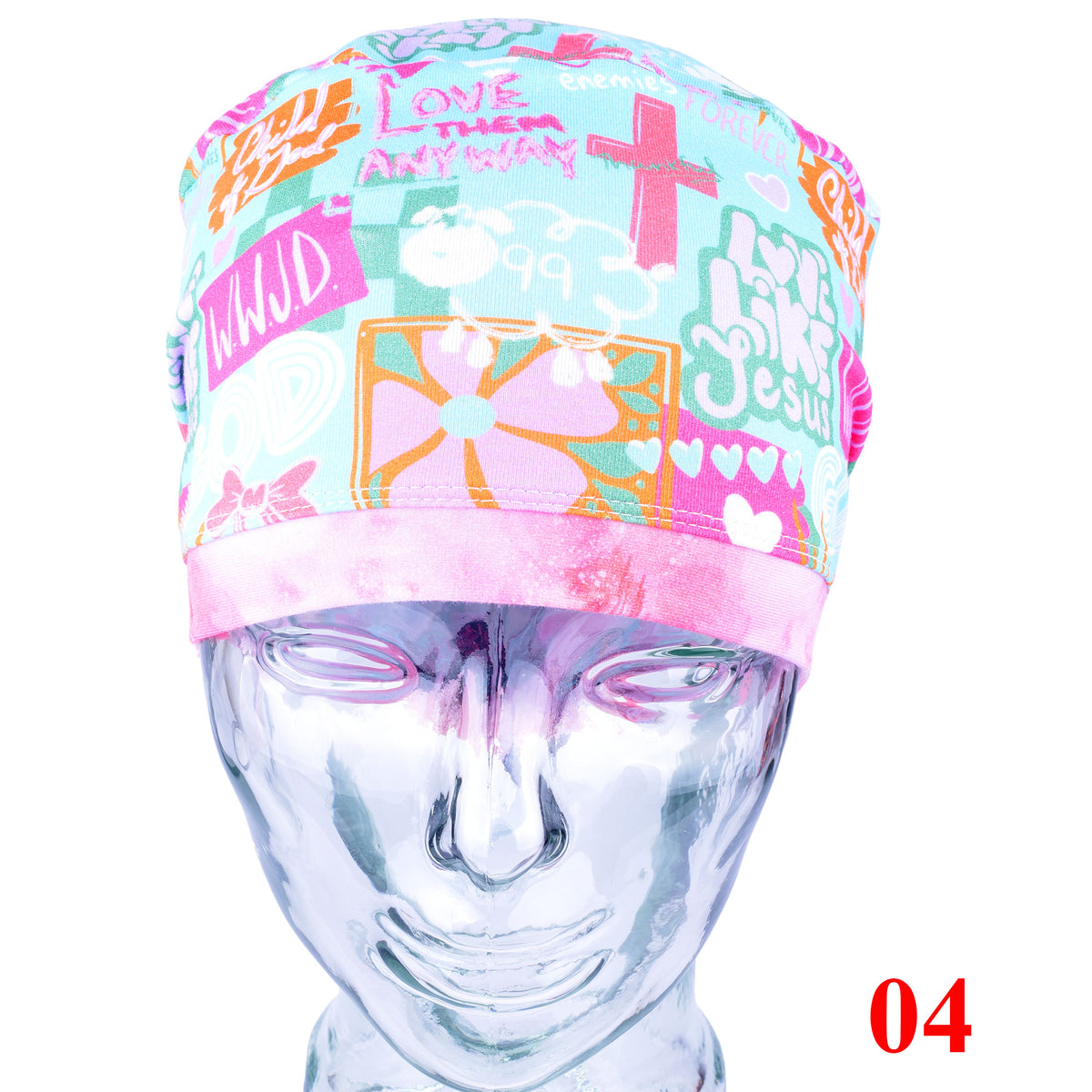 A multicolor faith based graphic print scrubs cap displayed on a metallic silver mannequin head against a white background. The cap features a light blue base with pink, orange, and white text and graphics, including 'LOVE THEM ANYWAY' and 'LOVE JESUS'.