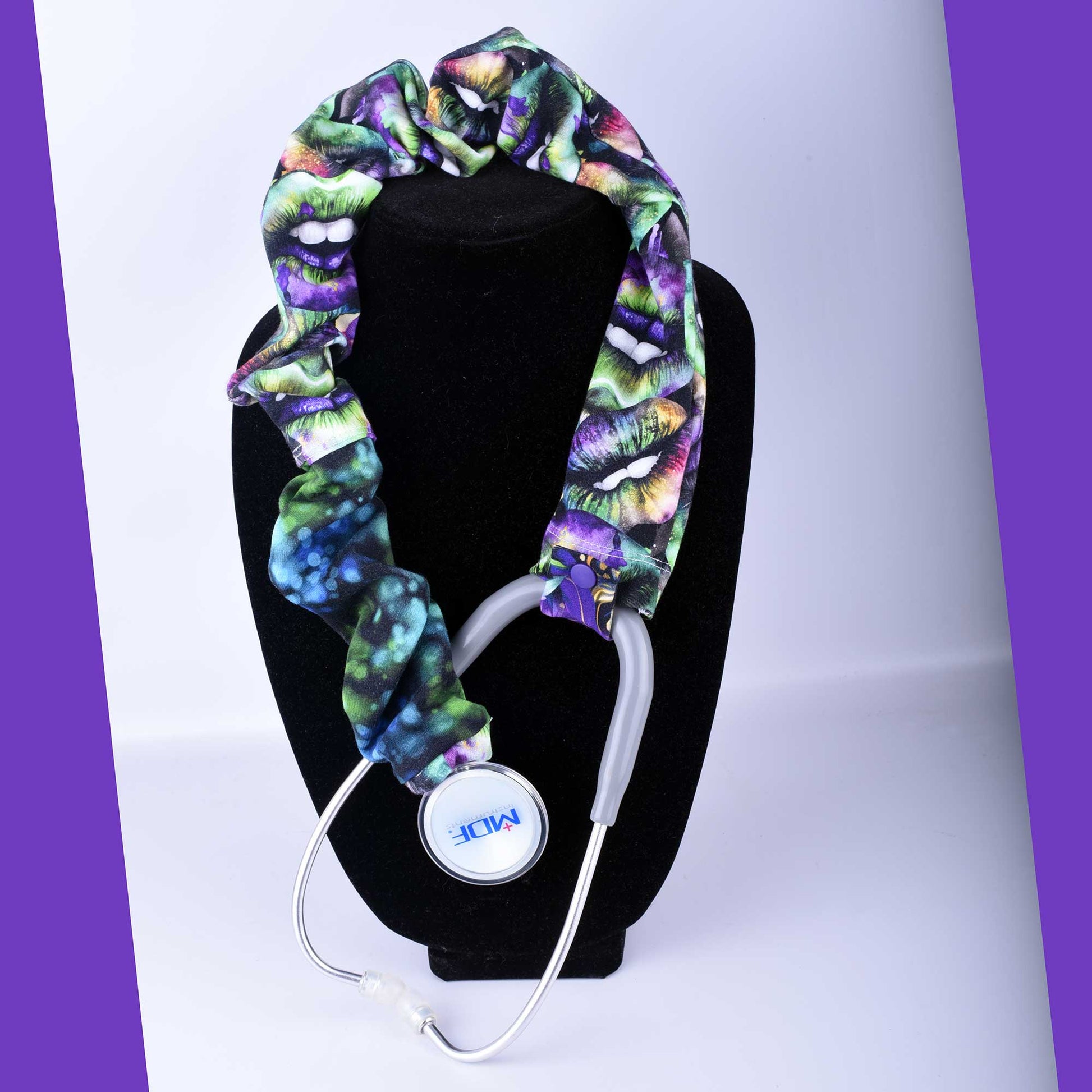 Lucky Lips pattern stethoscope cover made of stretchy cotton fabric, shown on a black stethoscope against a white background.