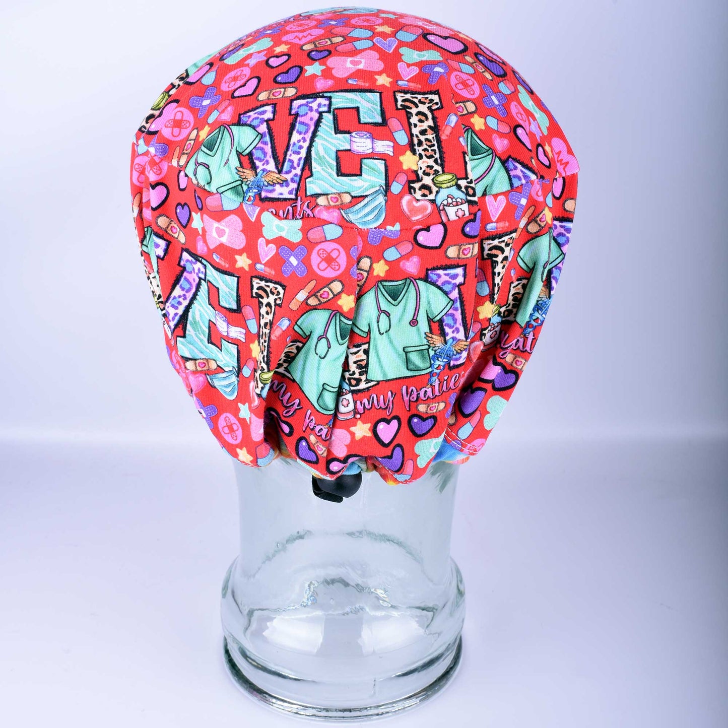 Full coverage Euro style medical hat with heart print and toggle adjustment, hand-crafted by Scrub Cap Hats.