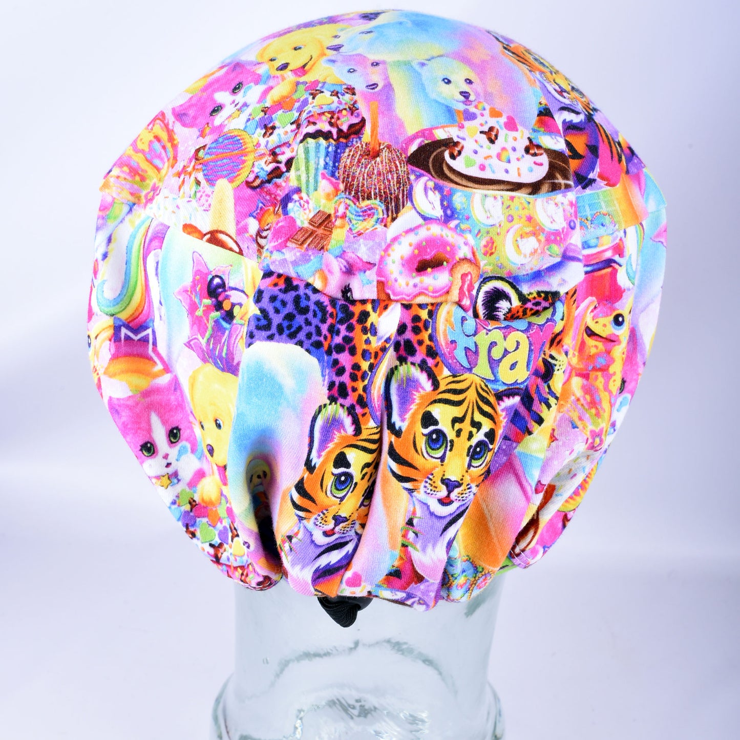Back view of Rainbow Friends Scrub Cap showing encased elastic and adjustable cord lock toggle for full hair coverage.