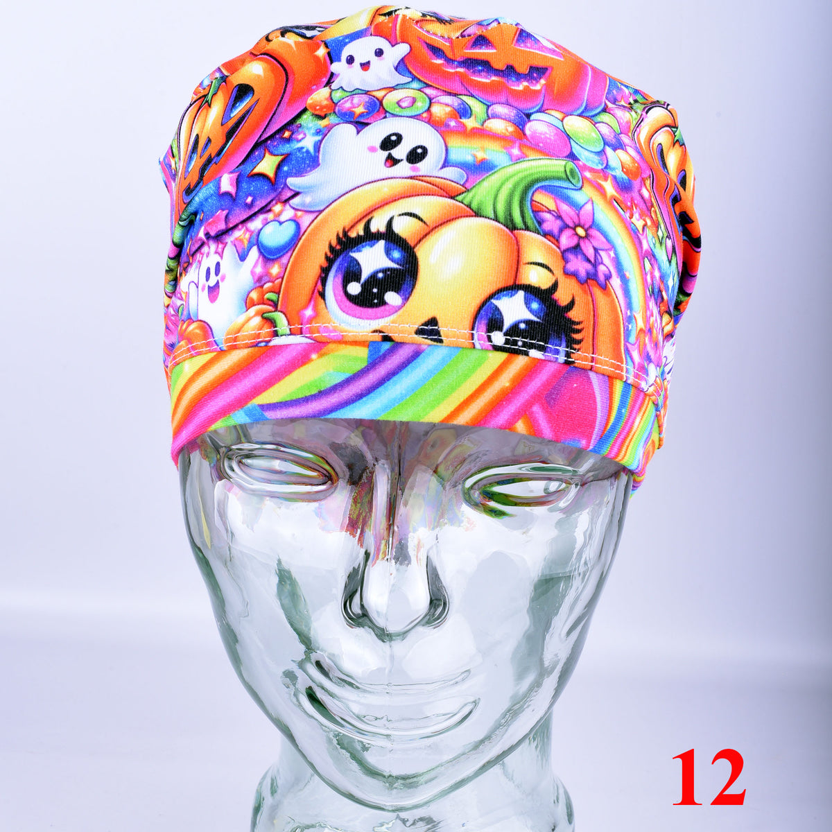 Close-up view of the Rainbow Pumpkins scrub cap in Design 12 styling, showcasing the bright neon-colored autumn pumpkin pattern.