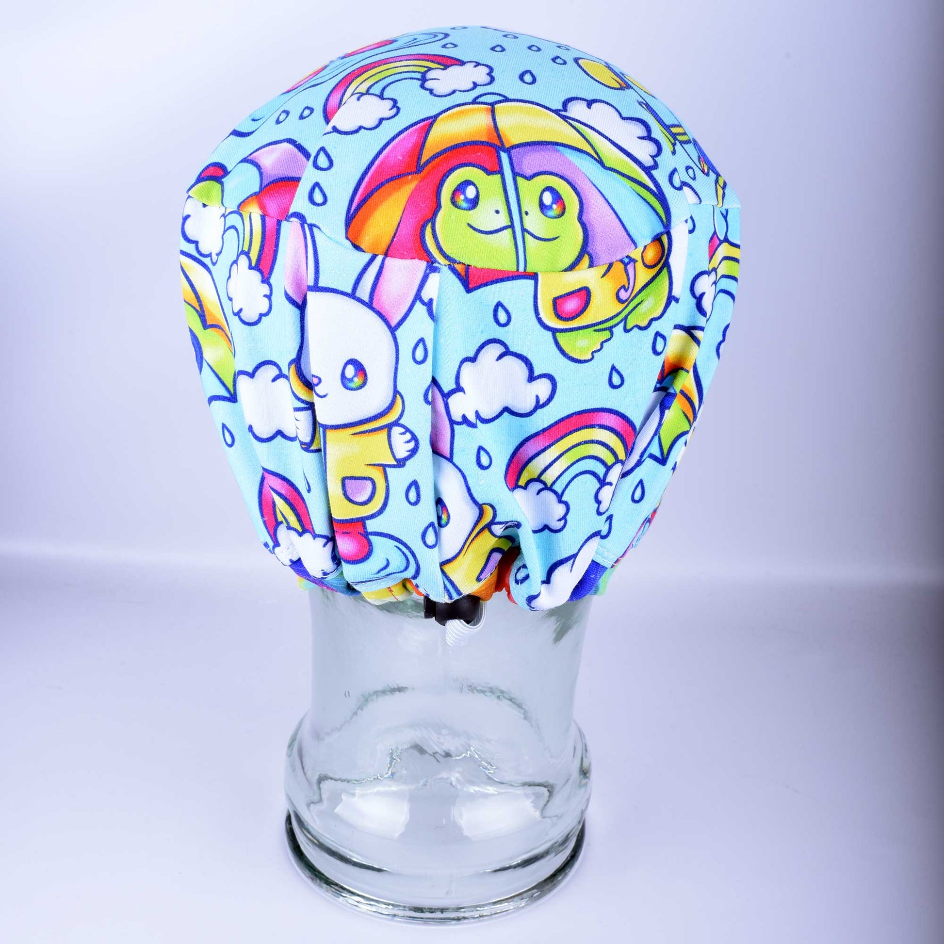 Back view of a Full Coverage Euro-style scrub cap showing adjustable elastic drawstring and heavy-duty toggle.