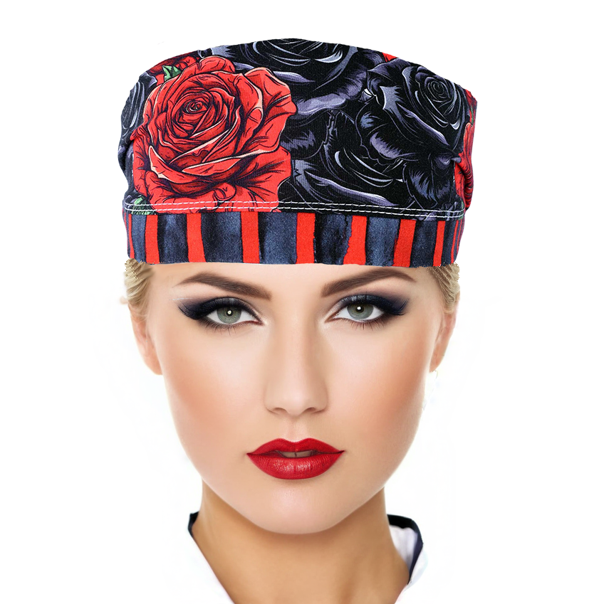 Woman wearing a colorful scrub cap with red and black roses on a white background