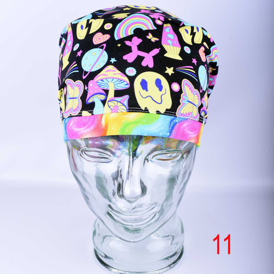 Front view of the Retro Days Full Coverage Scrub Cap on a clear mannequin head, showcasing the nostalgic 70s-inspired multicolor print and adjustable design.