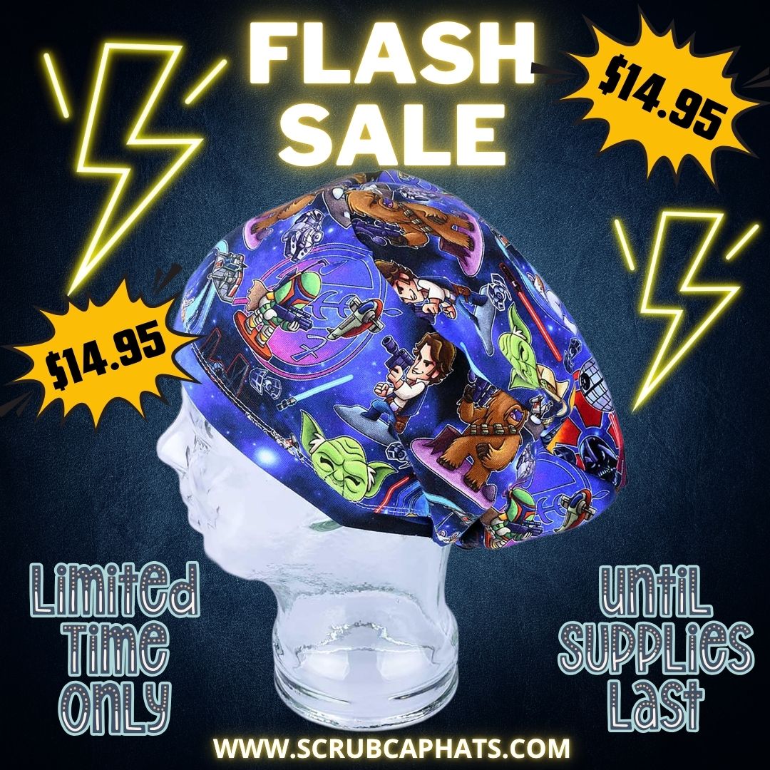 A scrub cap featuring a colorful Space Wars print on a blue background, displayed on a clear mannequin head. The image is heavily edited with promotional text overlays including 'FLASH SALE', '$14.