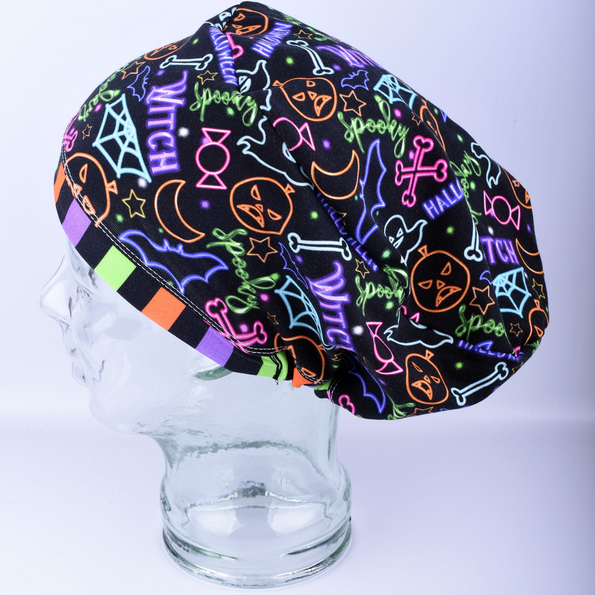 Halloween-themed scrub cap on a mannequin head against a white background