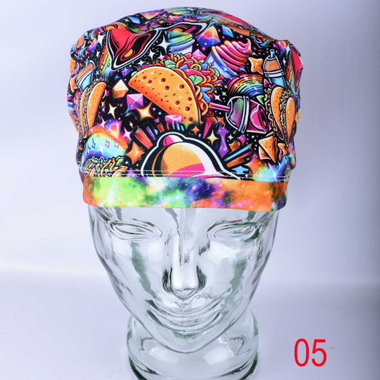 Close-up of the breathable Cotton-Elastane fabric on the Taco Time scrub cap, showing the detailed taco pattern and reinforced stitching.