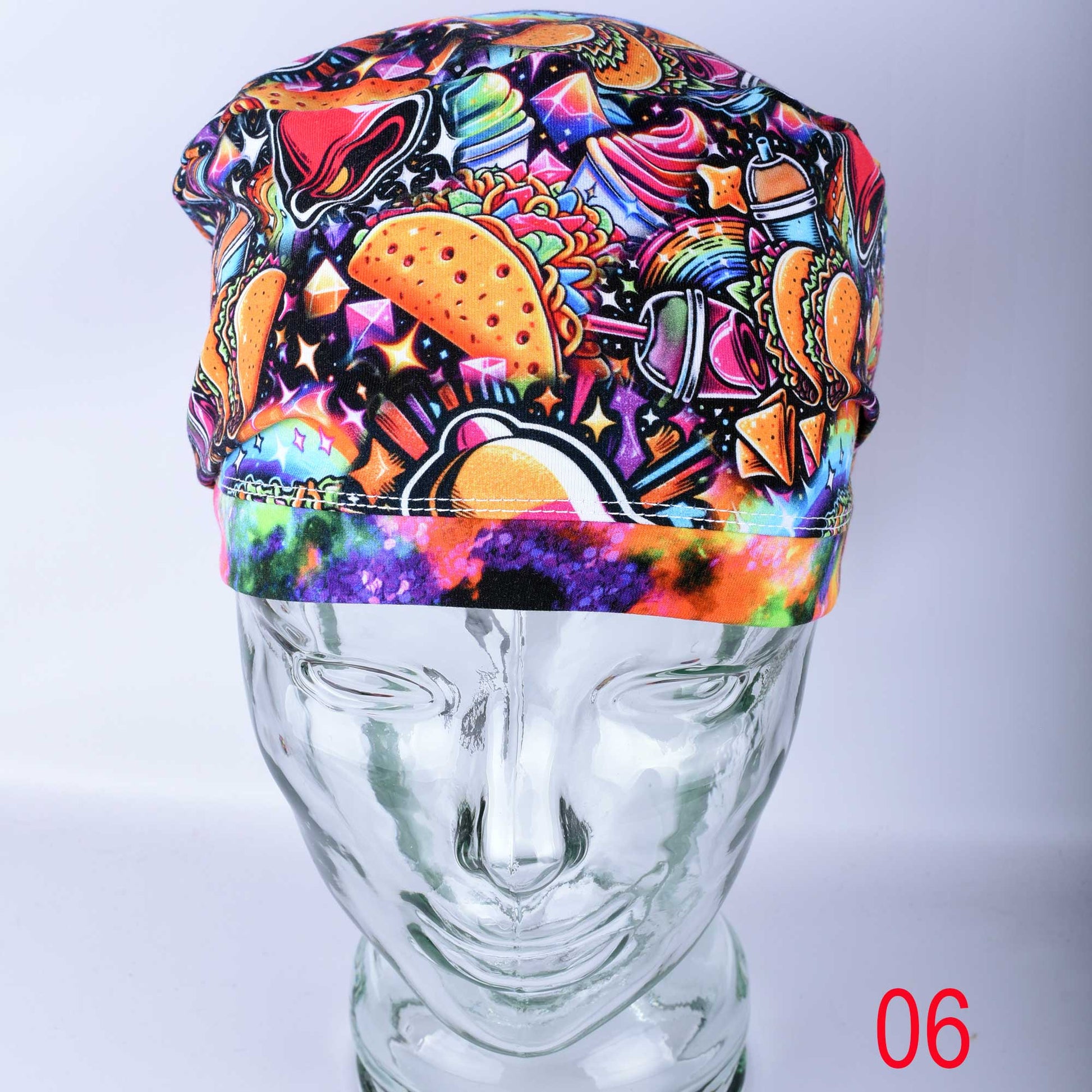 A Euro-style healthcare scrub cap featuring a colorful taco-themed print on a high-quality stretch knit fabric.