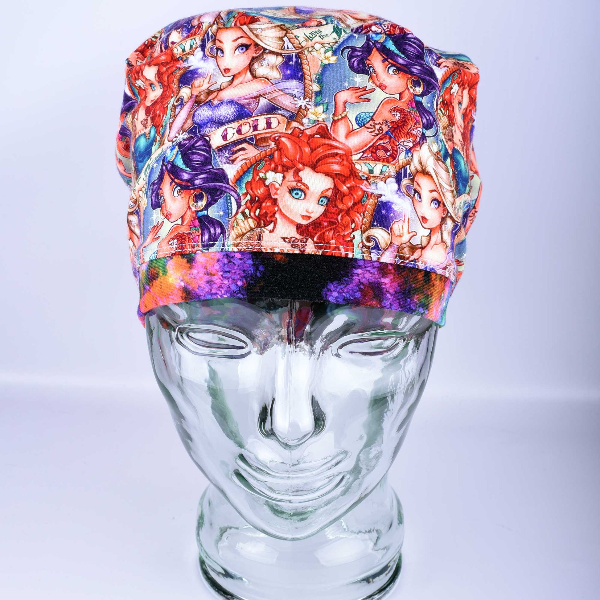 Close-up of the Tattoo Princess fabric detail on a stretchy cotton knit surgical cap