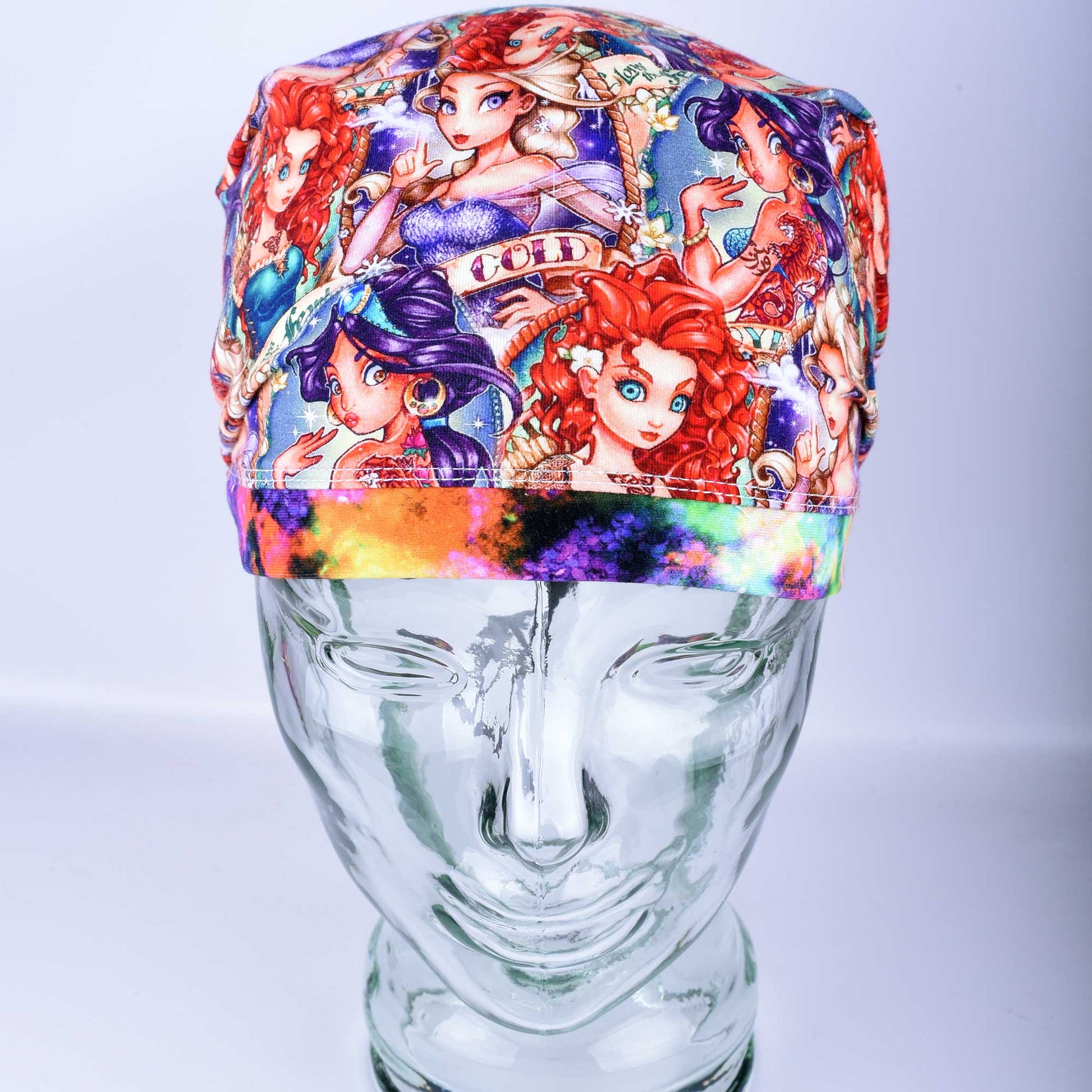 Close-up of the Tattoo Princess fabric detail on a stretchy cotton knit surgical cap.