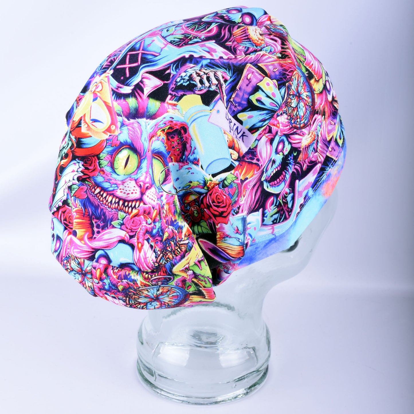 Angled perspective of a full-coverage scrub cap featuring a vibrant, multi-color zombie print.