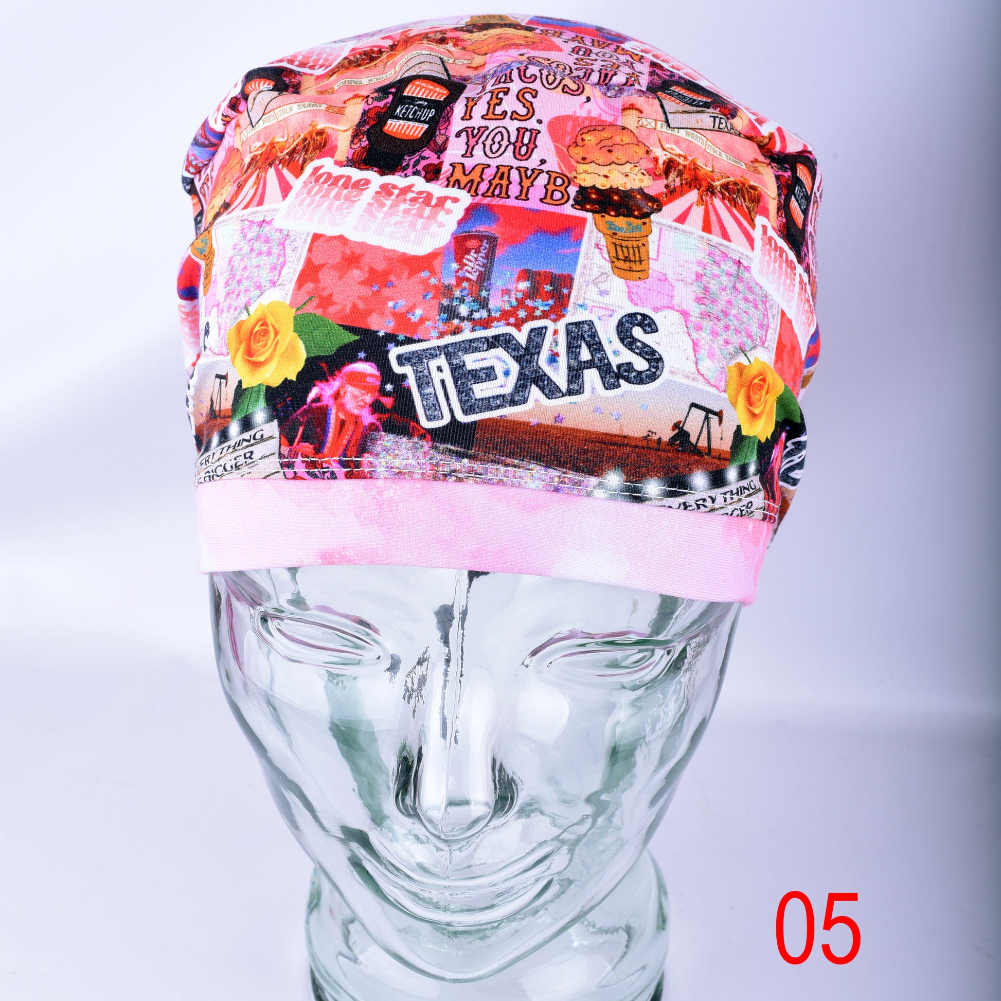 Front angle of the Texas Girl scrub cap with vibrant red, teal, and yellow Texas graphics on soft-stretch fabric.