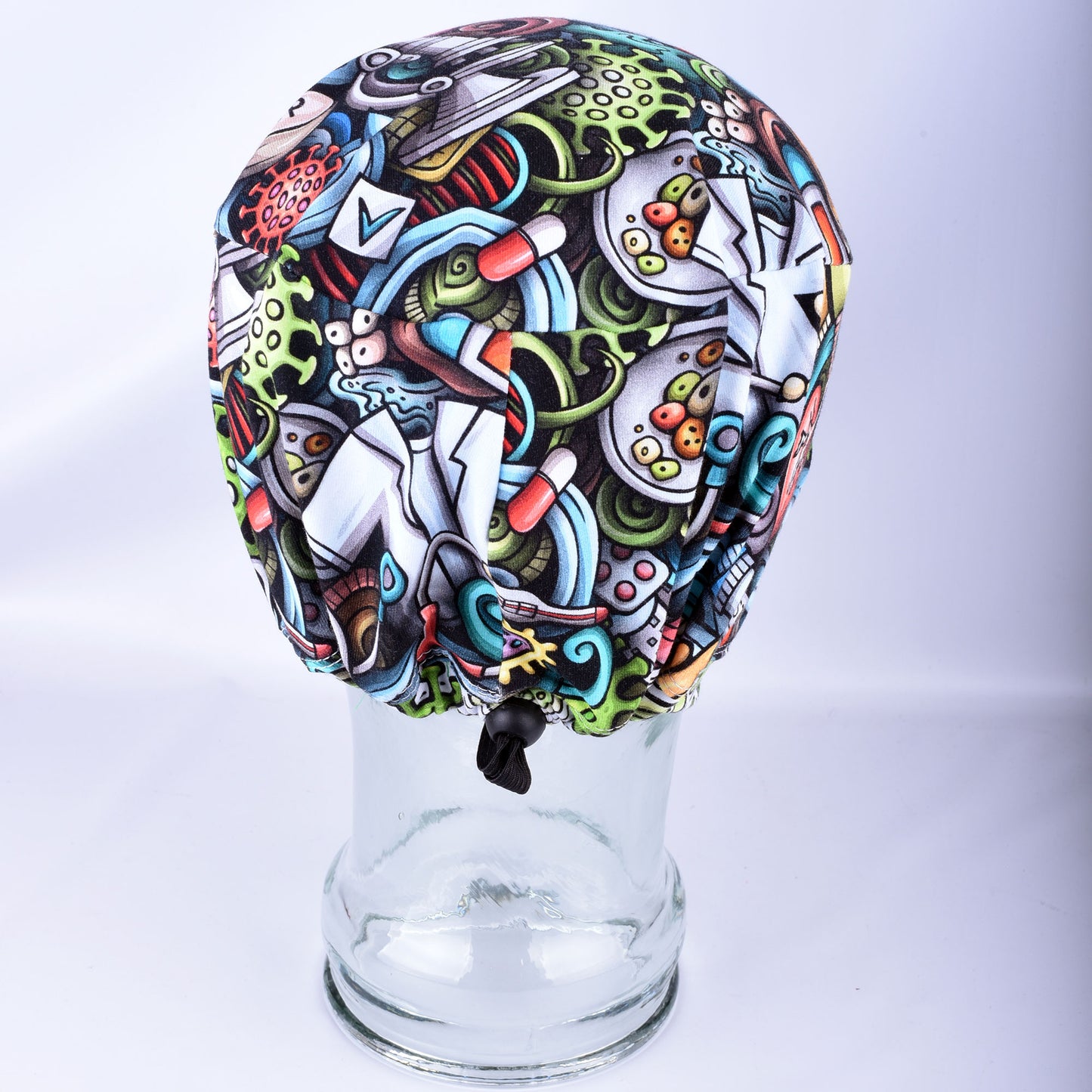 Back view of Viral Vibes Scrub Cap showing the encased elastic band and adjustable cord lock toggle for hair security