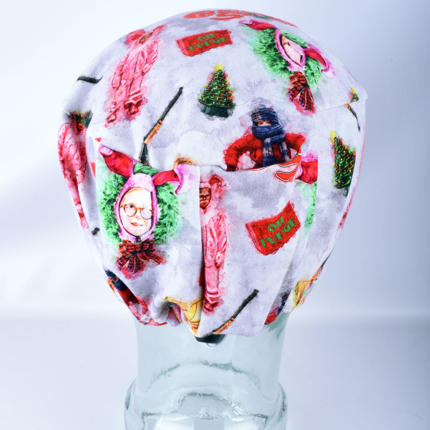 Front profile view of the festive Watercolor Christmas medical scrub cap, showcasing the smooth, comfortable fit across the forehead and secure hair coverage.