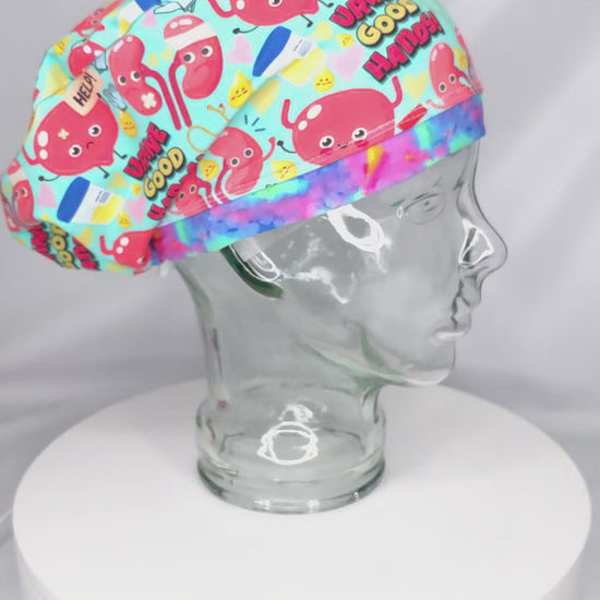 360-degree video demonstration showing the fit, texture, and details of the Urine Good Hands urology scrub cap.