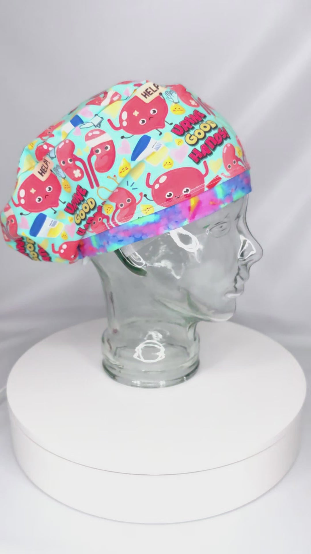 360-degree video demonstration showing the fit, texture, and details of the Urine Good Hands urology scrub cap.