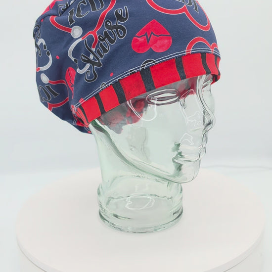 360-degree rotating view of the ICU Nurse Full Coverage Scrub Cap on a clear mannequin head, showcasing the navy blue background, red and blue medical graphics, and adjustable back toggle.